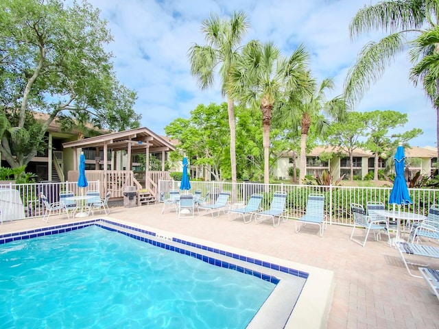 view of swimming pool featuring a patio