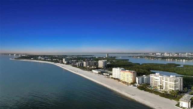 aerial view with a beach view and a water view