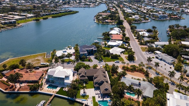 drone / aerial view with a water view