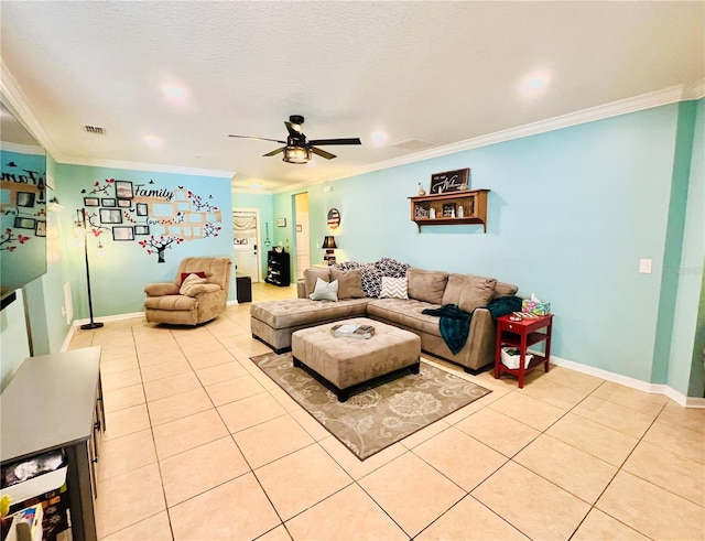 living room with crown molding, a textured ceiling, ceiling fan, and light tile floors