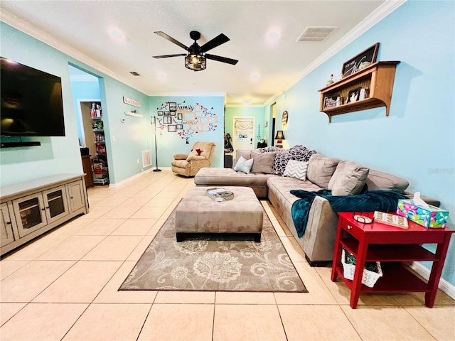 living room featuring crown molding, ceiling fan, and light tile flooring