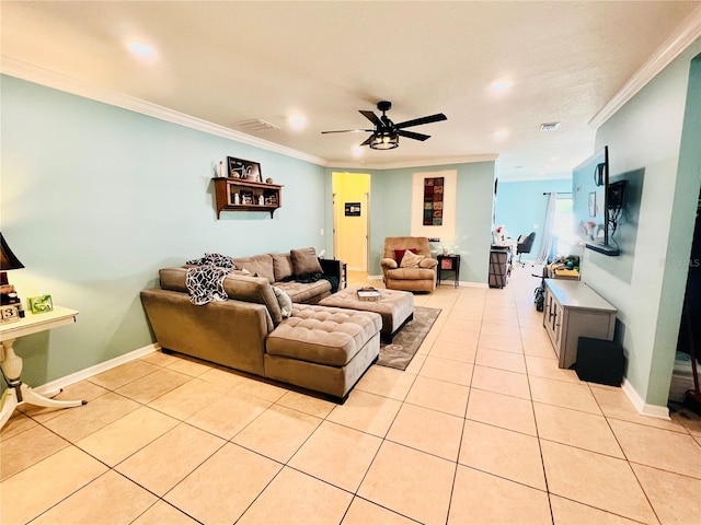 living room with ceiling fan, crown molding, and light tile floors