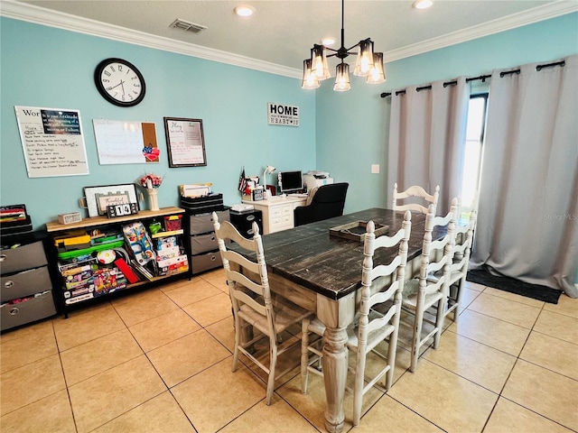 dining space with ornamental molding, light tile floors, and a chandelier