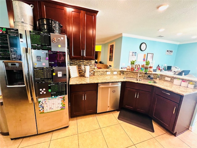 kitchen with sink, light tile flooring, crown molding, stainless steel appliances, and kitchen peninsula