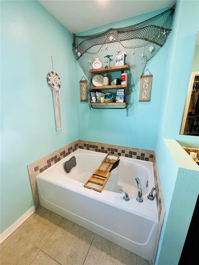 bathroom featuring tile floors and a bathing tub