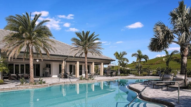 view of pool with a patio area