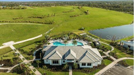 aerial view featuring a rural view and a water view