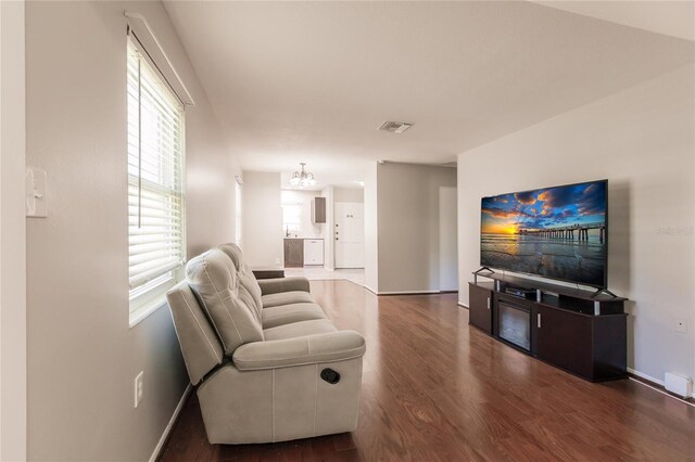 living room featuring dark hardwood / wood-style floors