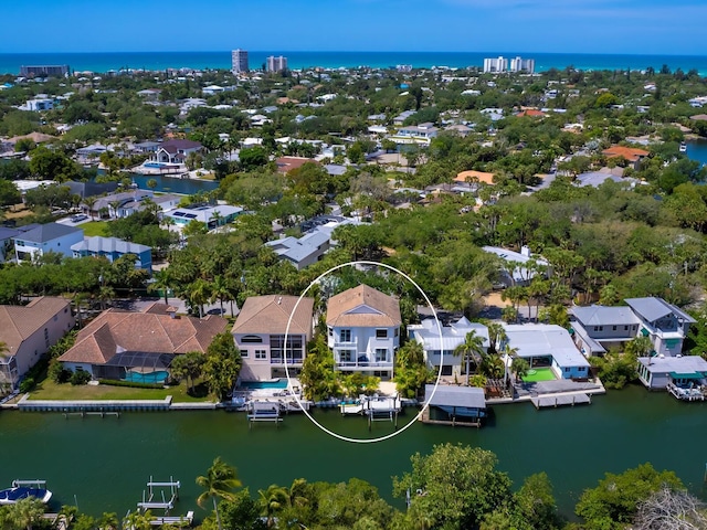 drone / aerial view with a water view