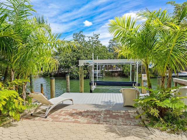 dock area featuring a water view