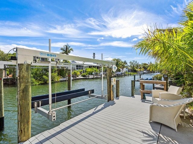 view of dock with a water view