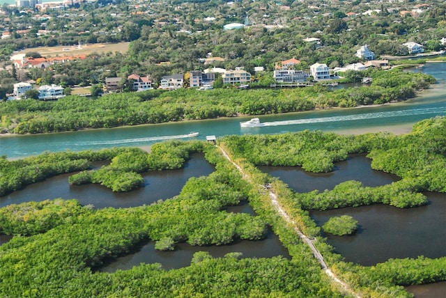 bird's eye view with a water view