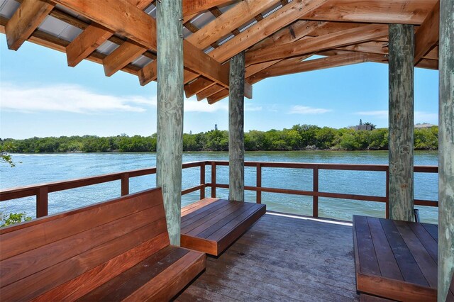 view of dock featuring a deck with water view