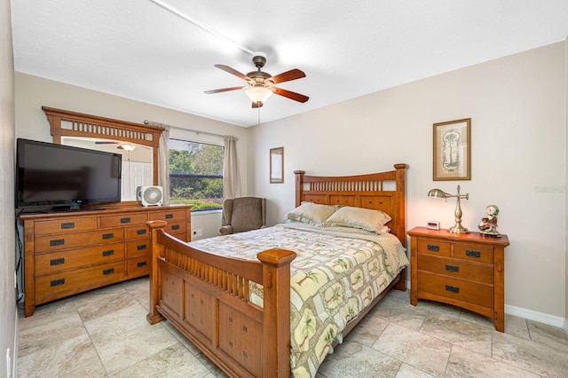 bedroom with ceiling fan and light tile floors