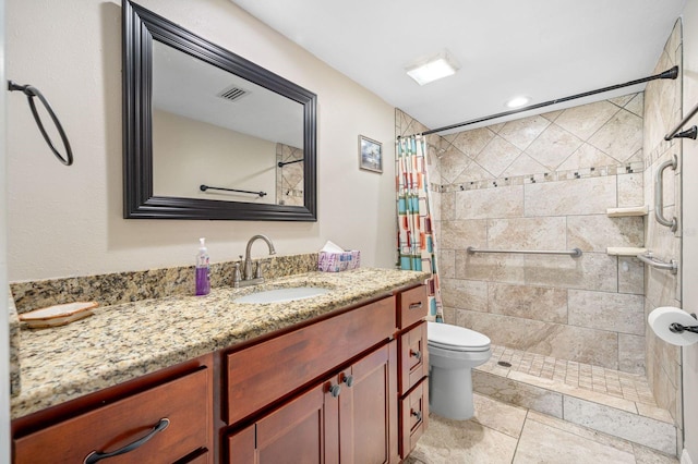 bathroom featuring curtained shower, toilet, tile flooring, and vanity