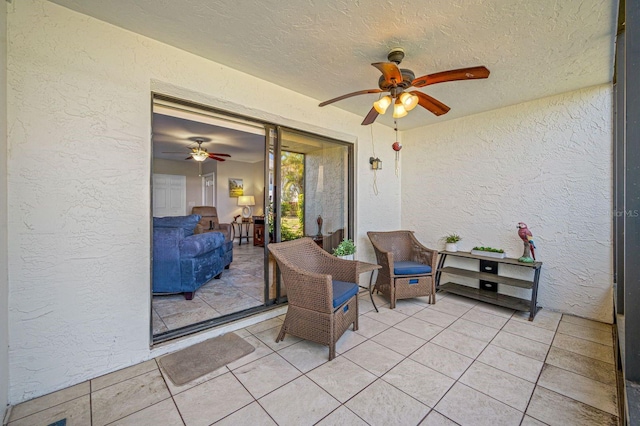 view of patio with ceiling fan