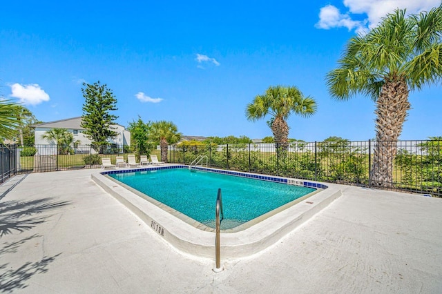 view of swimming pool featuring a patio