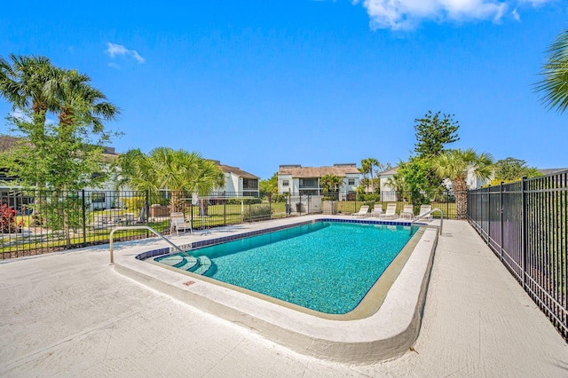 view of swimming pool featuring a patio