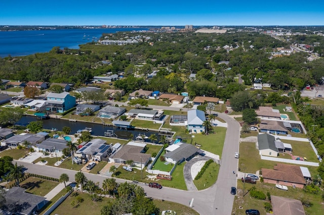 birds eye view of property featuring a water view