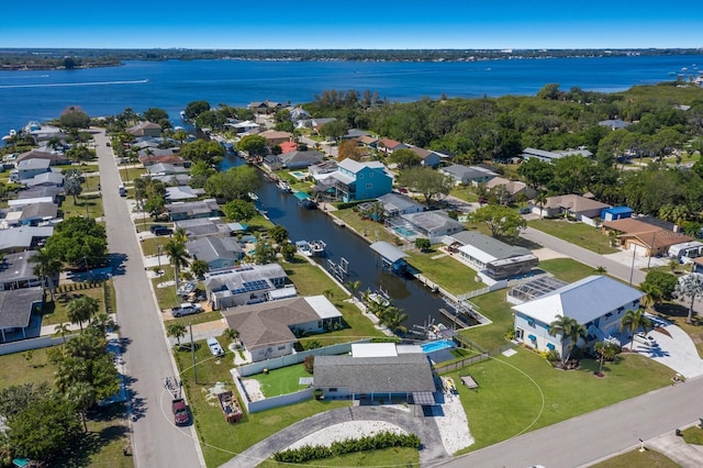 bird's eye view with a water view