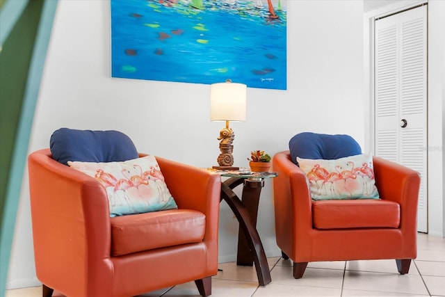 living area featuring tile floors