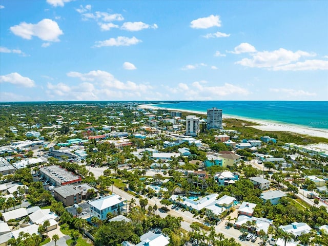 bird's eye view featuring a beach view and a water view