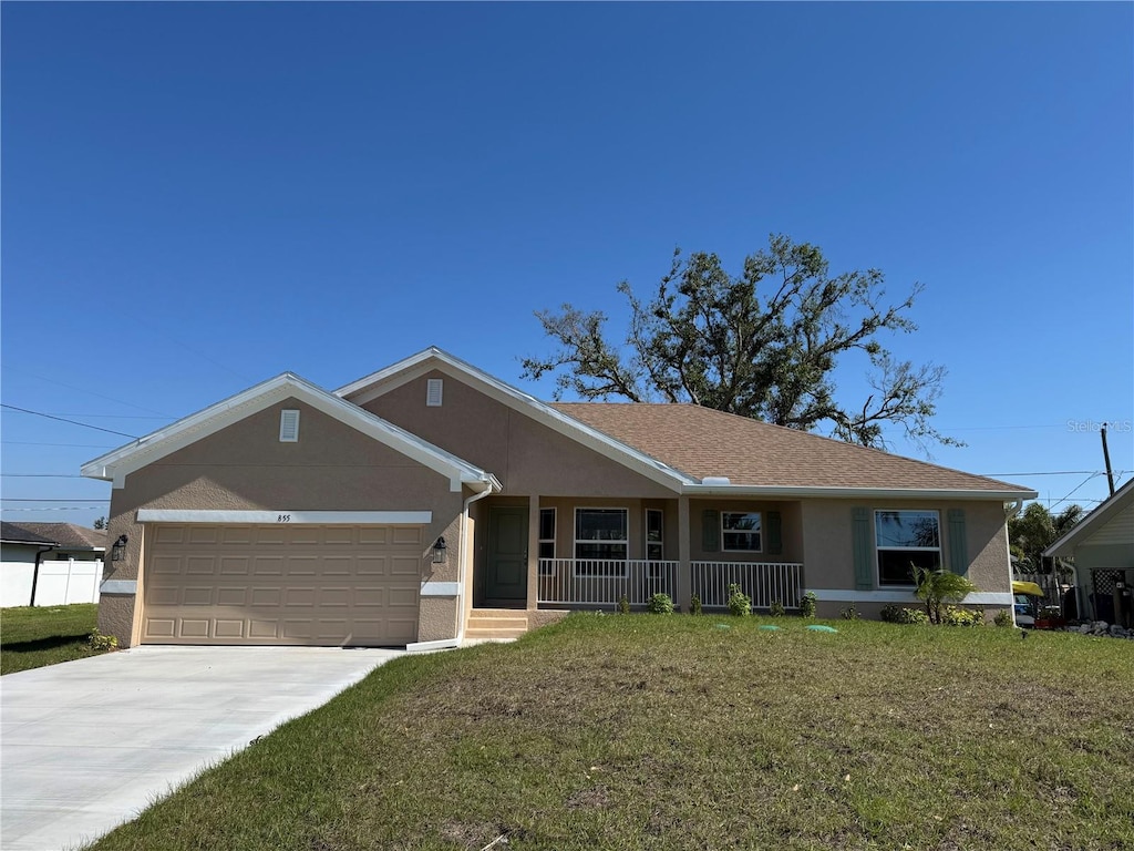 single story home featuring driveway, a garage, a front lawn, a porch, and stucco siding