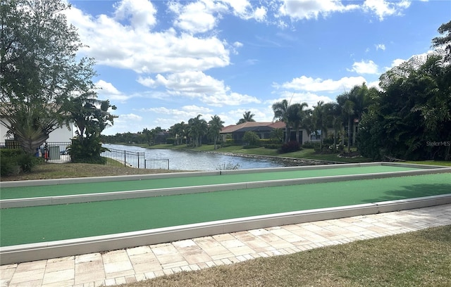 view of home's community with a water view