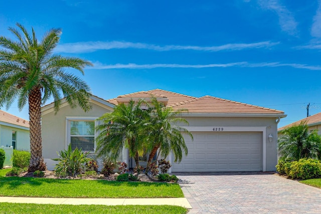 view of front of property featuring a garage