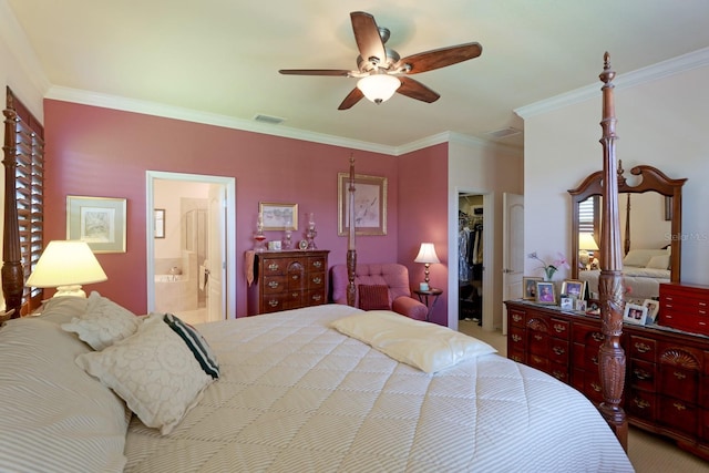 bedroom featuring a spacious closet, ceiling fan, a closet, connected bathroom, and ornamental molding