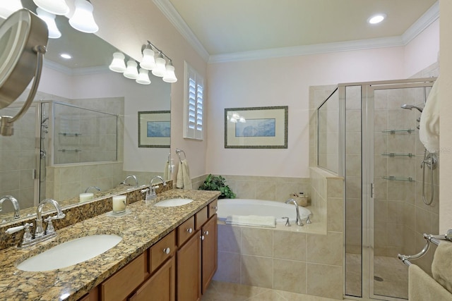 bathroom with tile flooring, double sink vanity, crown molding, and shower with separate bathtub