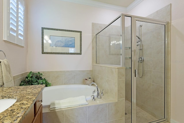 bathroom with vanity, shower with separate bathtub, and crown molding