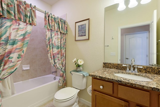 full bathroom with vanity with extensive cabinet space, shower / tub combo, and toilet