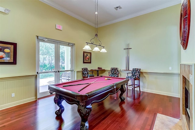 playroom with dark hardwood / wood-style floors, billiards, and ornamental molding