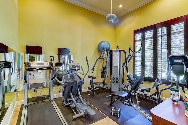 exercise room with ornamental molding