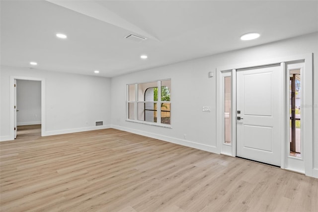 entrance foyer with light hardwood / wood-style flooring