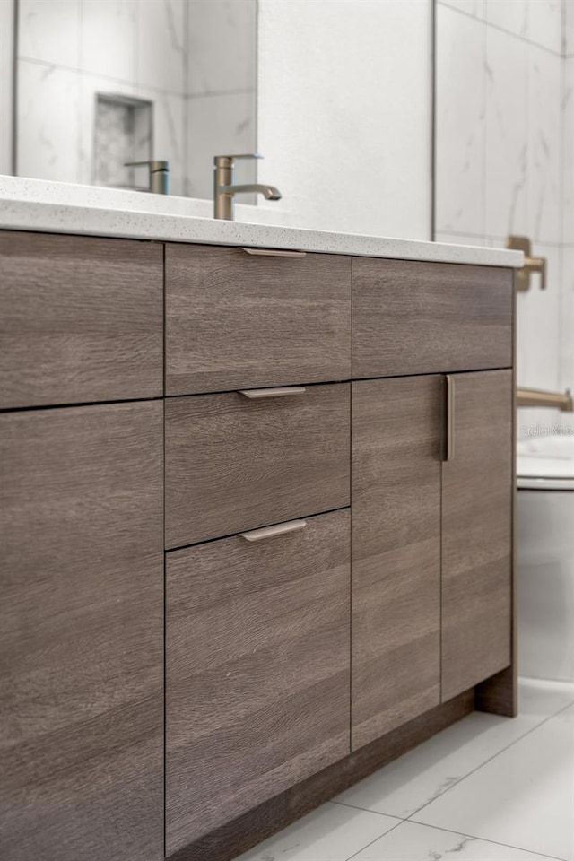 bathroom with tile patterned floors