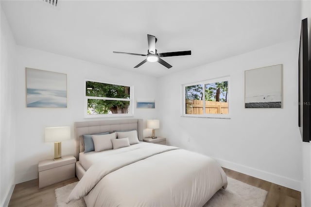 bedroom featuring ceiling fan and light wood-type flooring