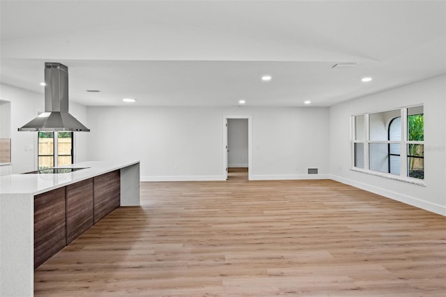 unfurnished living room featuring light wood-type flooring