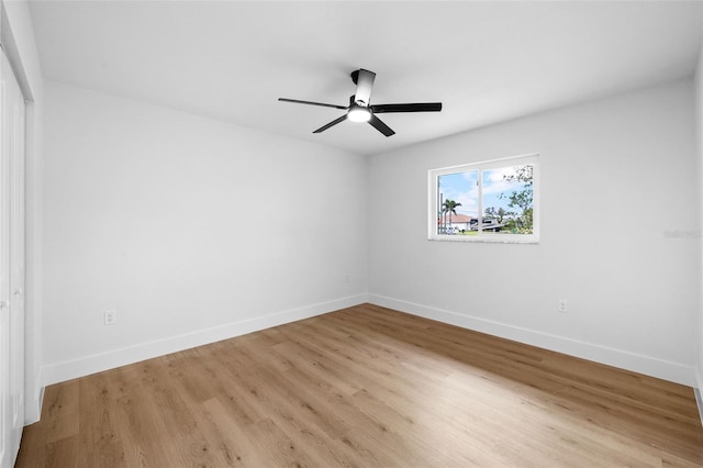 unfurnished room featuring light hardwood / wood-style floors and ceiling fan