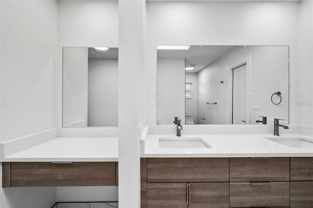 bathroom featuring double sink vanity