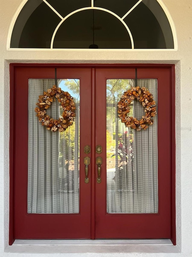 entrance to property featuring french doors