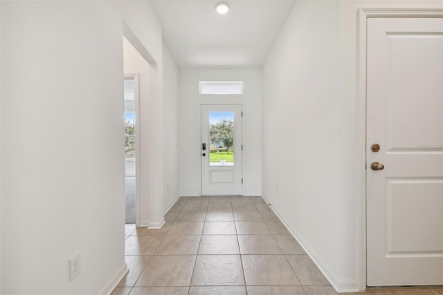 entryway featuring light tile patterned flooring