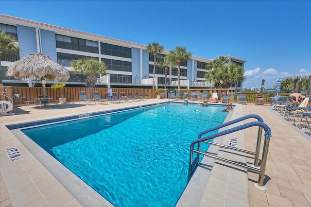 view of swimming pool with a patio area