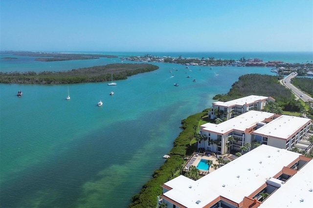 drone / aerial view with a water view