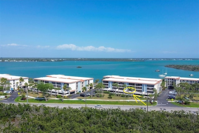 drone / aerial view featuring a water view