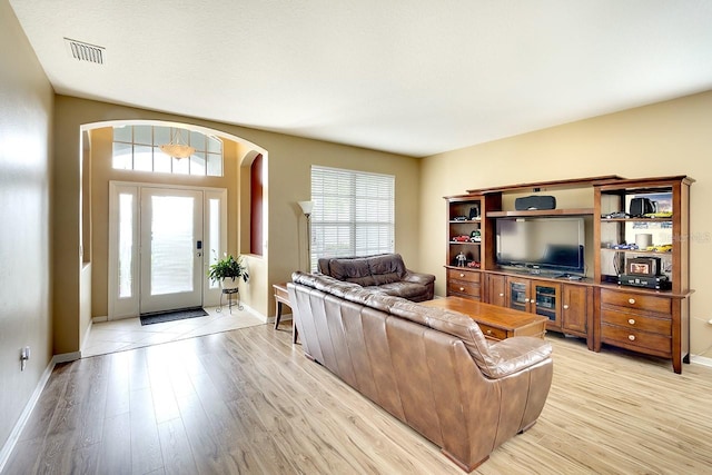 living room with light hardwood / wood-style flooring