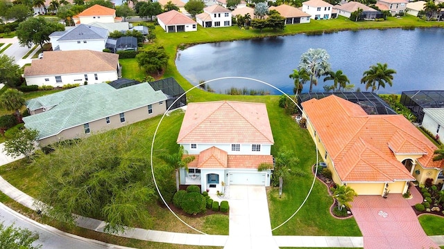 drone / aerial view with a water view