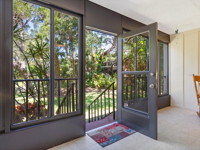 entryway featuring light tile flooring