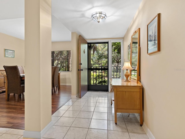 foyer featuring light tile flooring